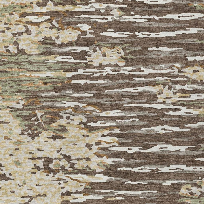 Abstract wash area rug surface close-up with cream, brown, gray, and olive distressed lines.