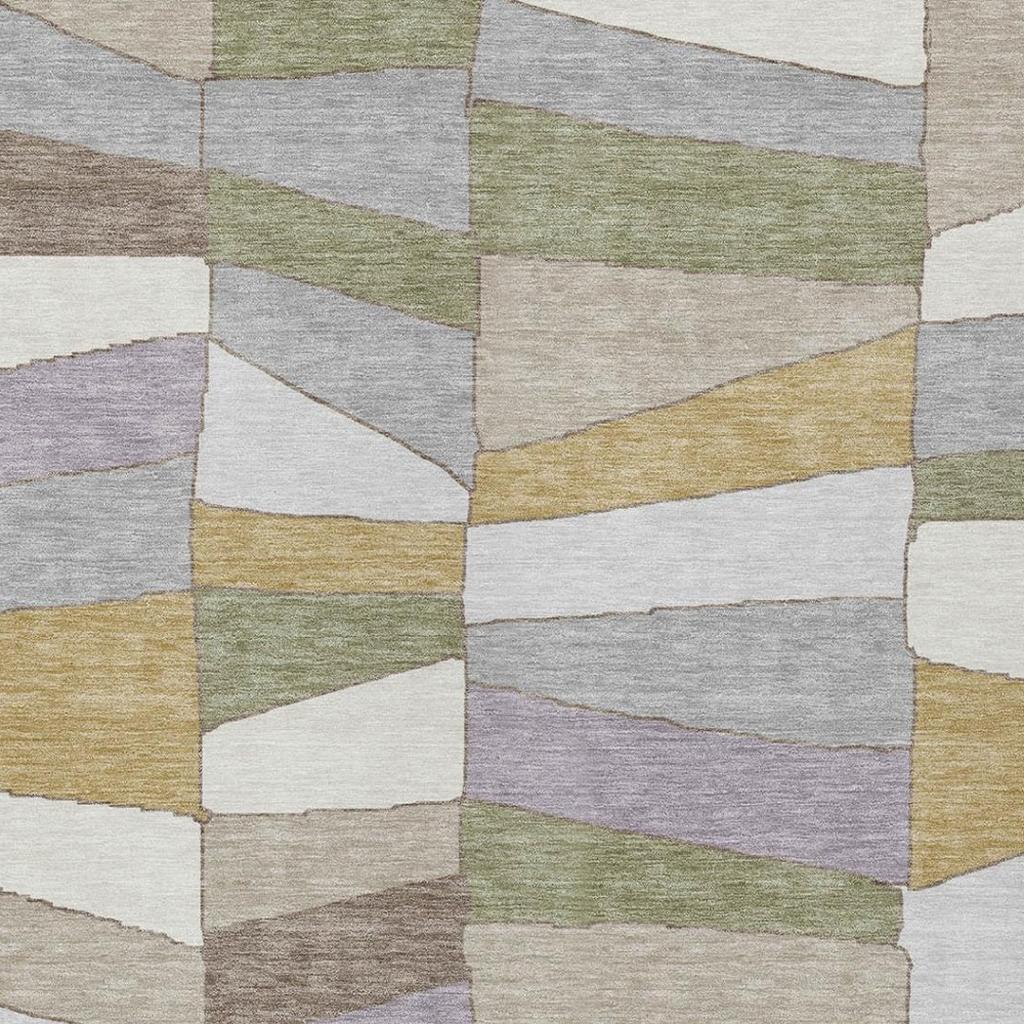 Geometric area rug close-up of cube blocks in gray, white, olive green, and mustard
