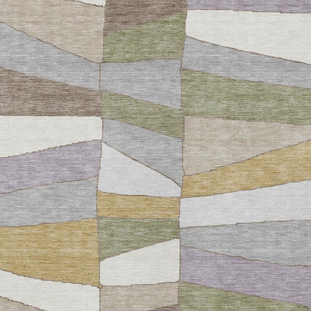 Geometric area rug close-up showing cube blocks in gray, beige, olive, and pale purple