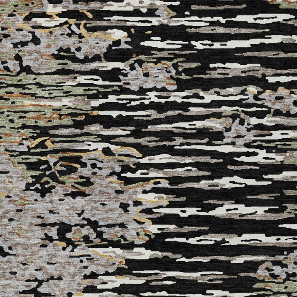 Abstract area rug with black stripes and light gray background plus small muted color flecks