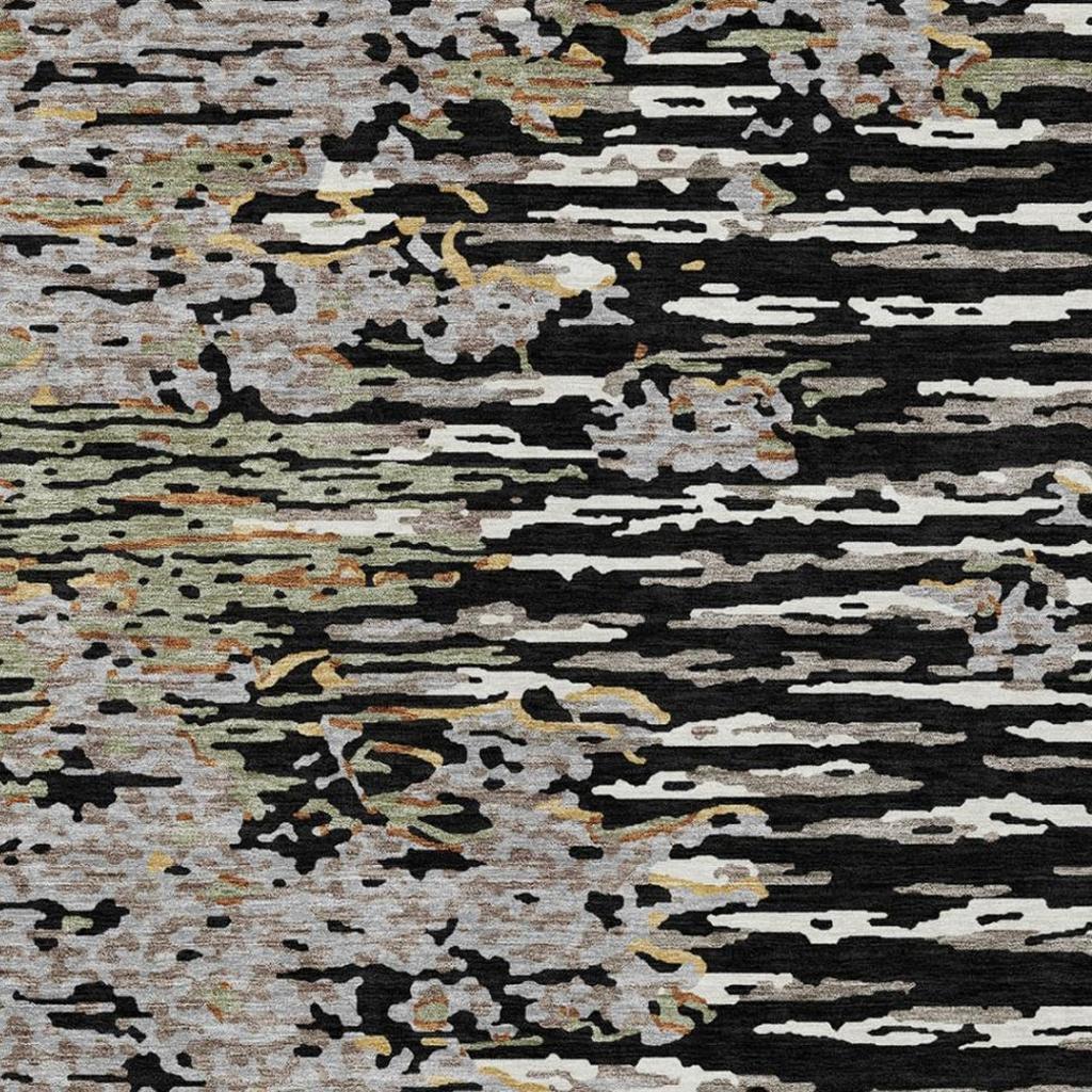 Abstract area rug with black, graphite, and light gray distressed horizontal stripes