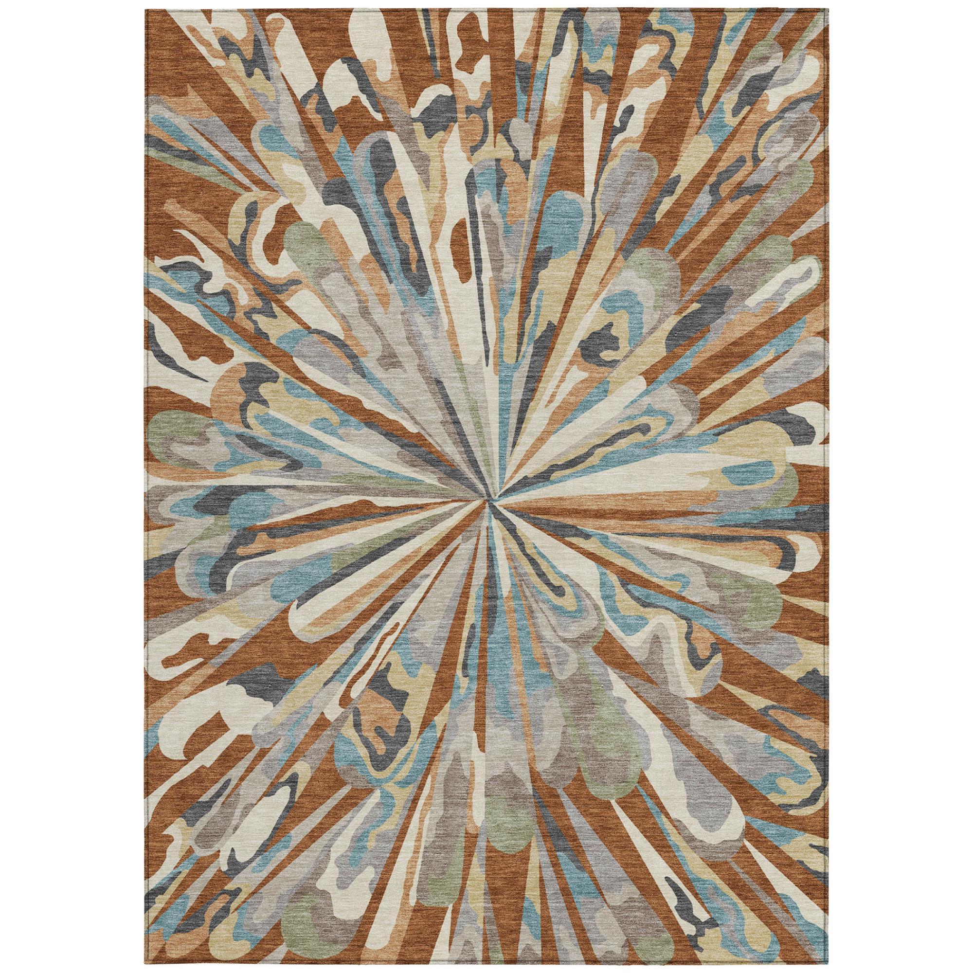 Abstract area rug featuring a radial sunburst design in orange and teal with tan and gray.