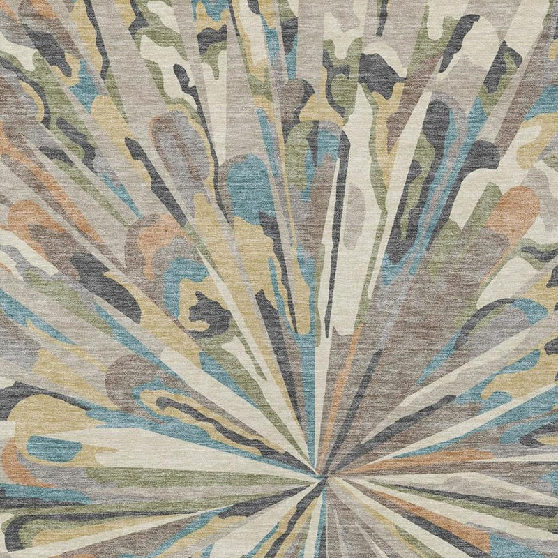 Abstract area rug centered burst pattern in beige with blue, green, tan, and gray accents