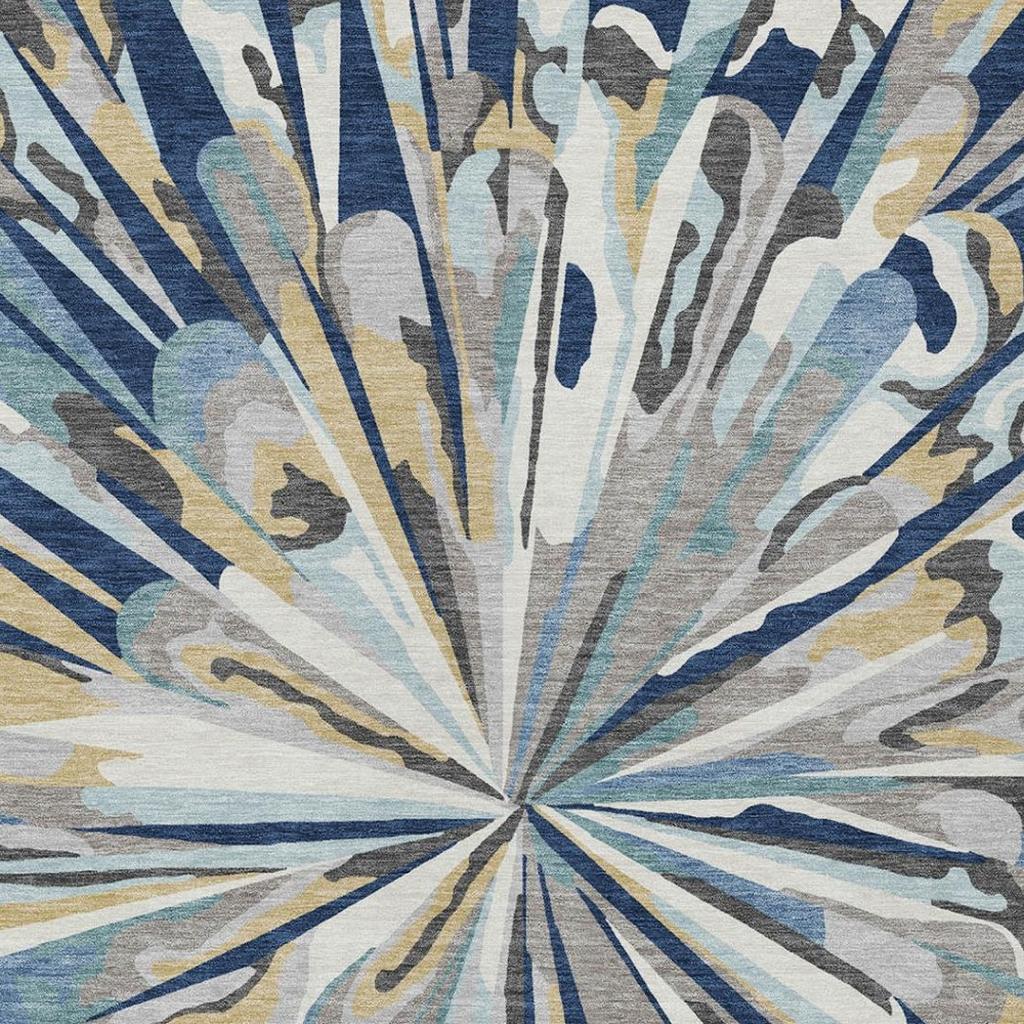 Sunburst abstract rug in navy blue, light blue, and cream with radial center