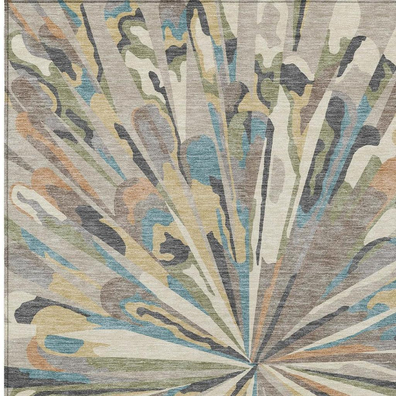 Abstract area rug with sunburst rays in beige, brown, teal, and blue tones.