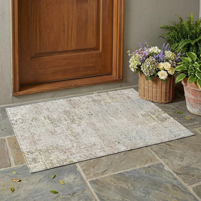 Rectangular abstract area rug in ivory with silver-gray distressed pattern
