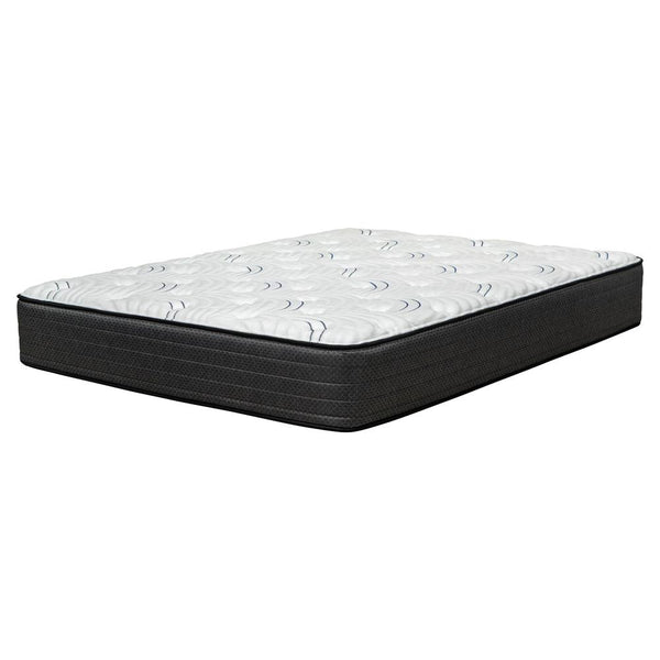 Medium hybrid mattress with white quilted top and dark charcoal foam sides