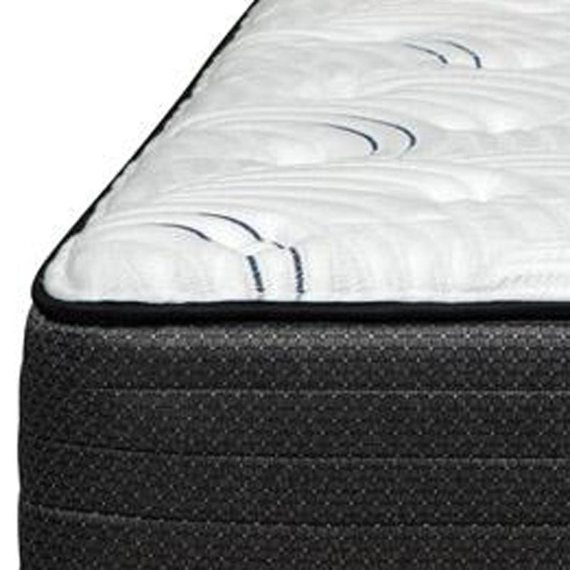 Hybrid mattress top view, white surface with blue wave pattern and dark edge
