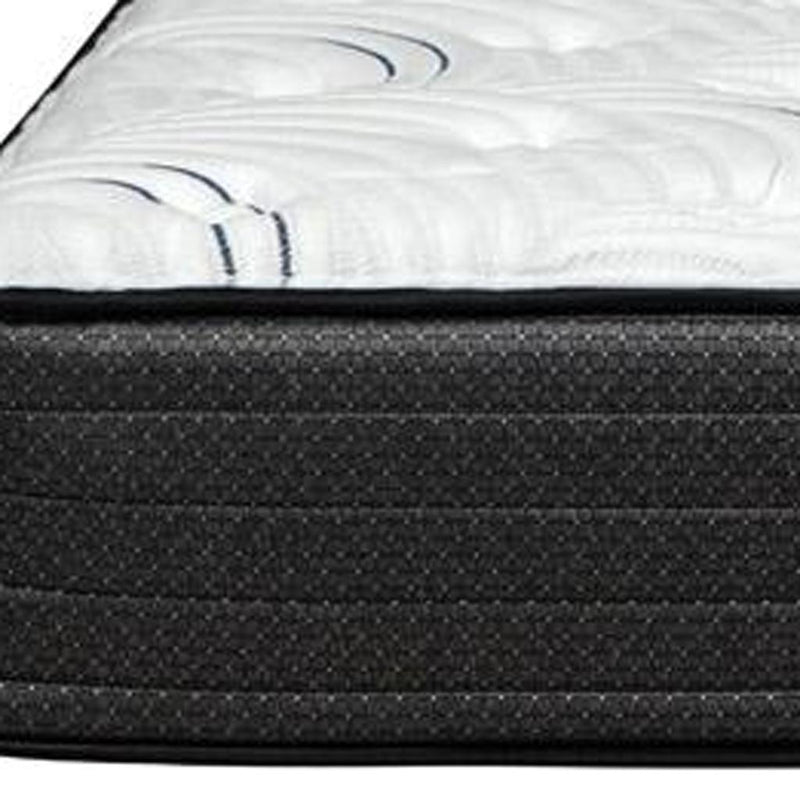 11 in hybrid mattress top view: white quilted surface with blue swirl patterns