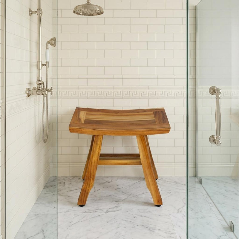 Teak shower bench with curved slatted seat and lower support shelf