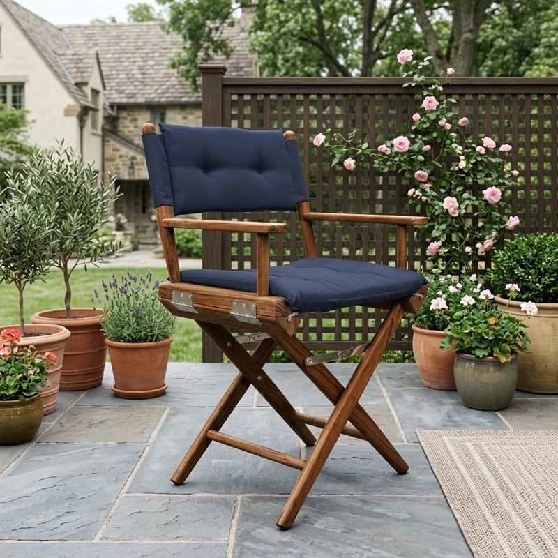 Navy-cushioned wood director chair with padded backrest and seat, folding frame