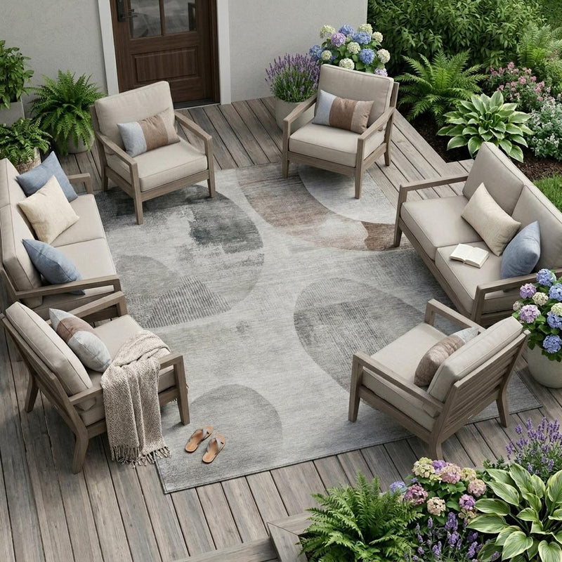 Light gray abstract geometric area rug with taupe tones for indoor or outdoor use
