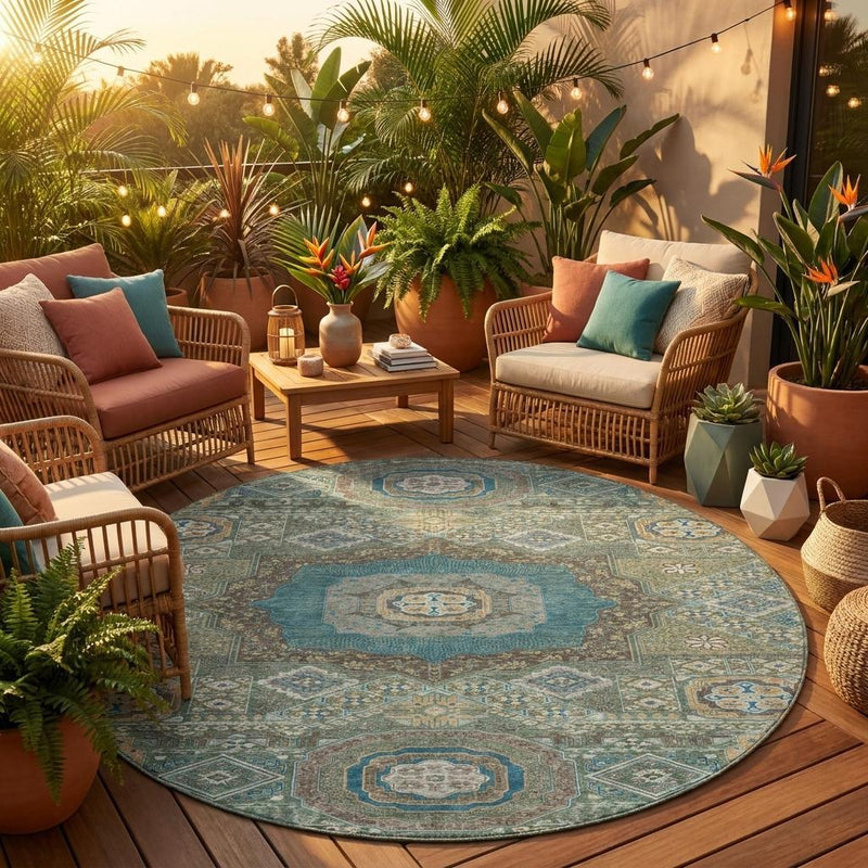 Round oriental area rug with teal and green geometric medallion pattern.