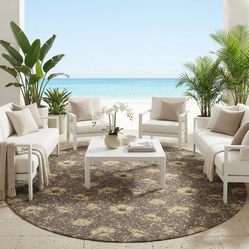 Round washable indoor/outdoor area rug with brown and coffee floral pattern