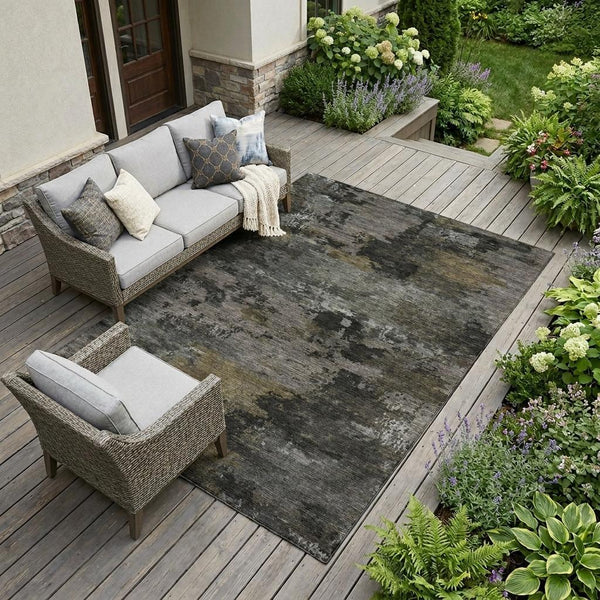 Abstract pewter and gray area rug with distressed pattern, indoor/outdoor use