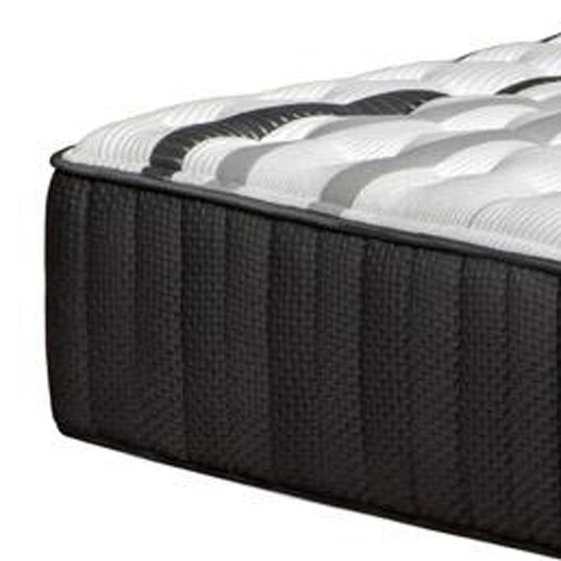 Queen hybrid mattress close-up of dark charcoal side panel with textured vertical stitching