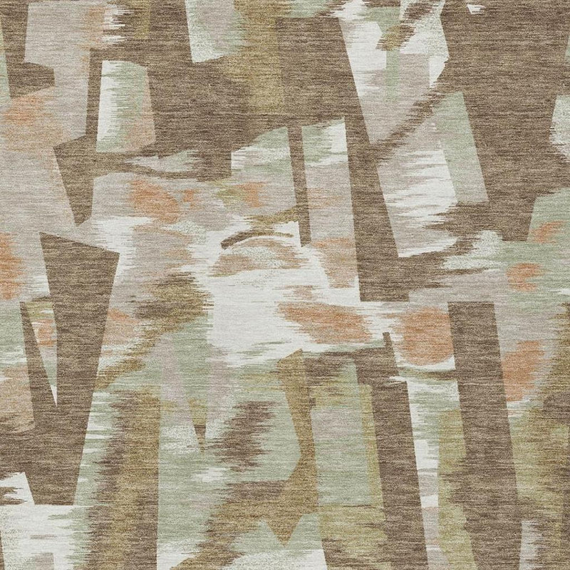 Close-up abstract rug texture with brown, beige, white, and hints of green geometric shapes