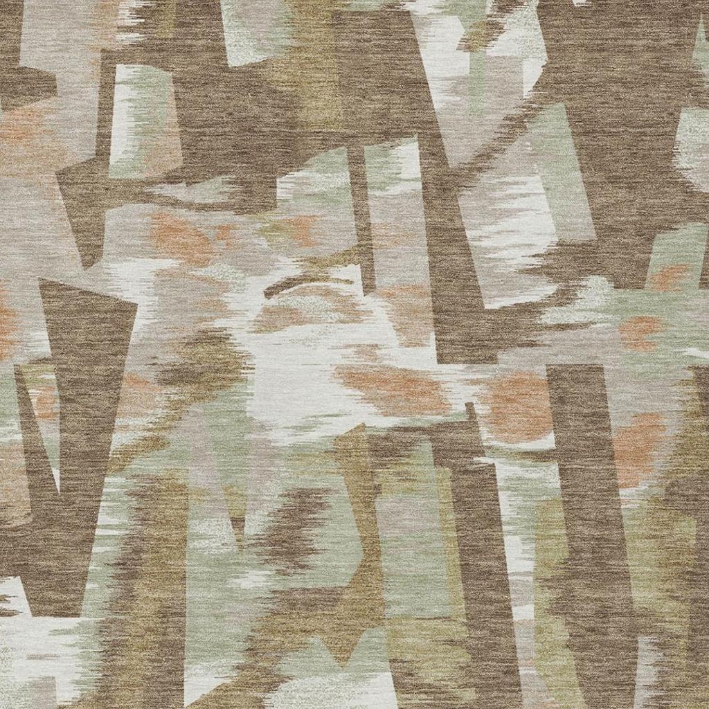 Brown, beige, and light green abstract area rug pattern with distressed paint-like blocks