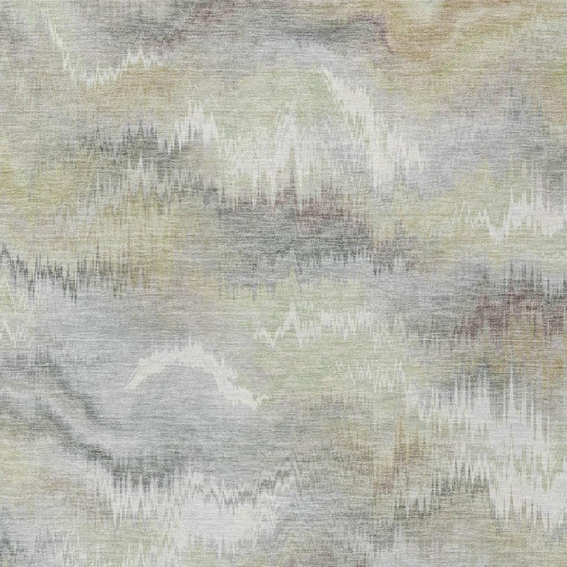 Abstract area rug close-up with washed horizontal strokes in ivory, green, and gray