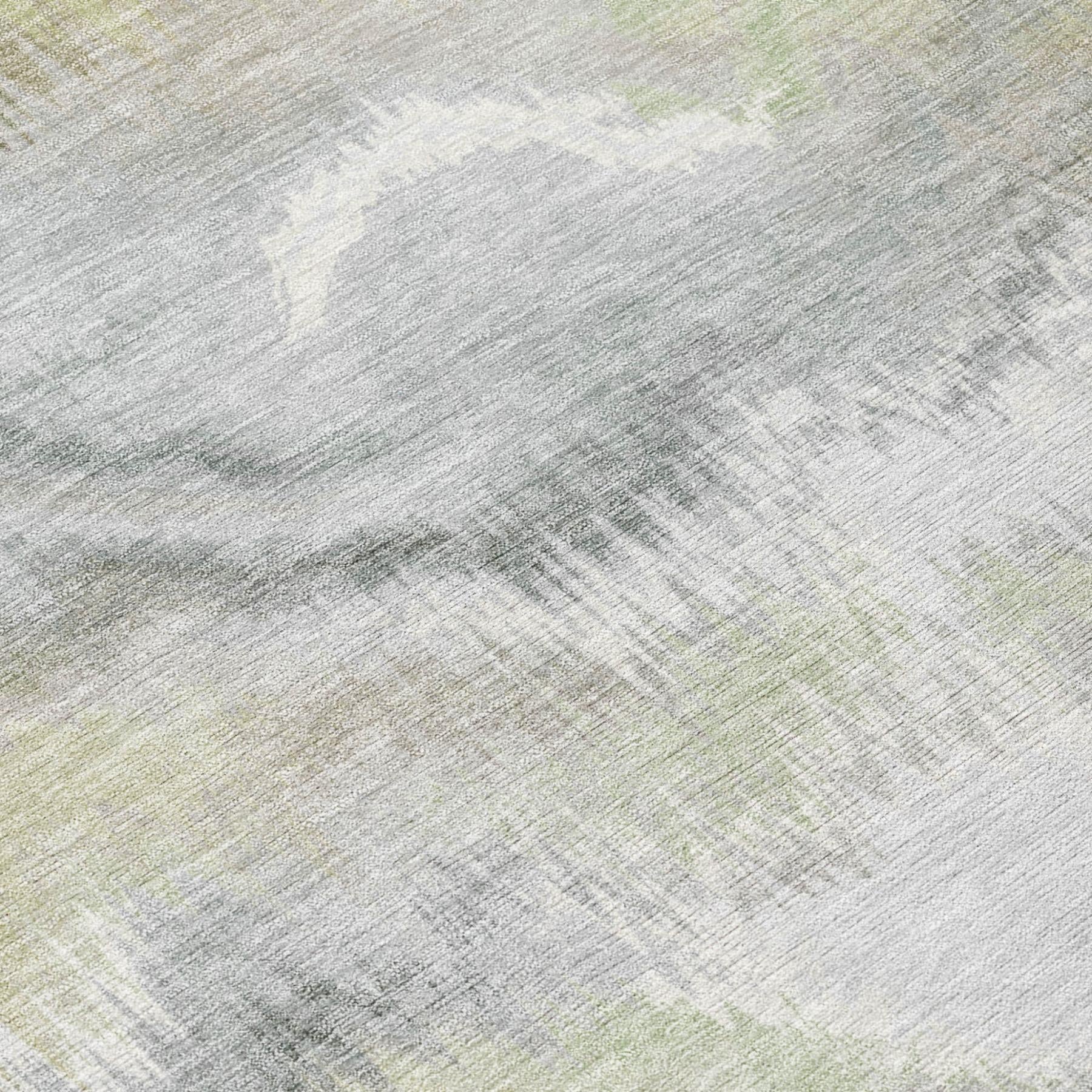 Abstract area rug texture with light ivory base and subtle green wash marks
