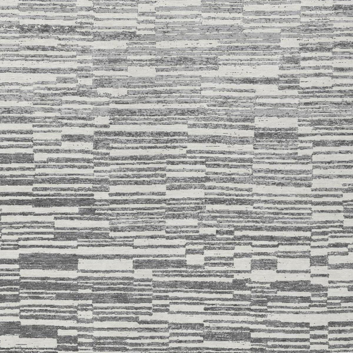 Close-up of graphite and gray distressed stripe pattern on area rug