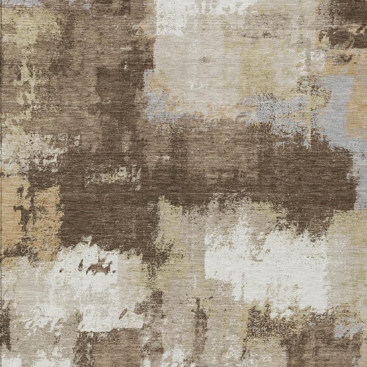 Close-up abstract rug surface with faded cream and dark brown patchwork texture