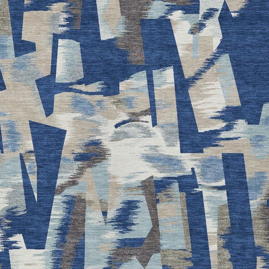Washable abstract area rug pattern in blue, beige, and neutral tan strokes