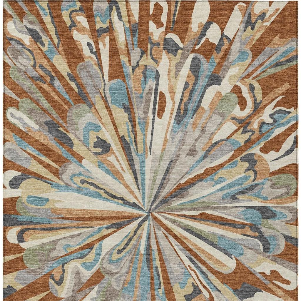 Full view abstract area rug with centered sunburst design in teal, orange, gray, and beige