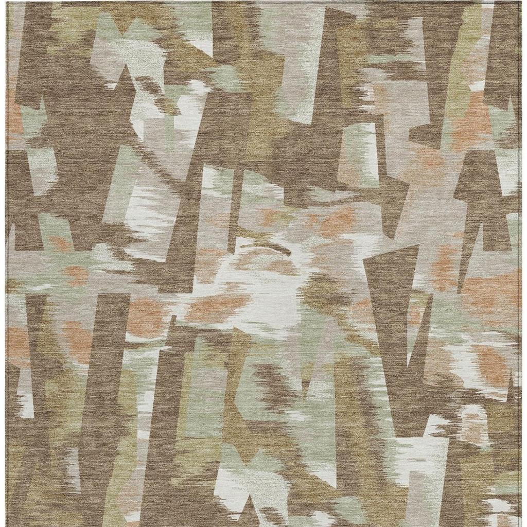 Abstract indoor outdoor area rug with beige, brown, and white block shapes