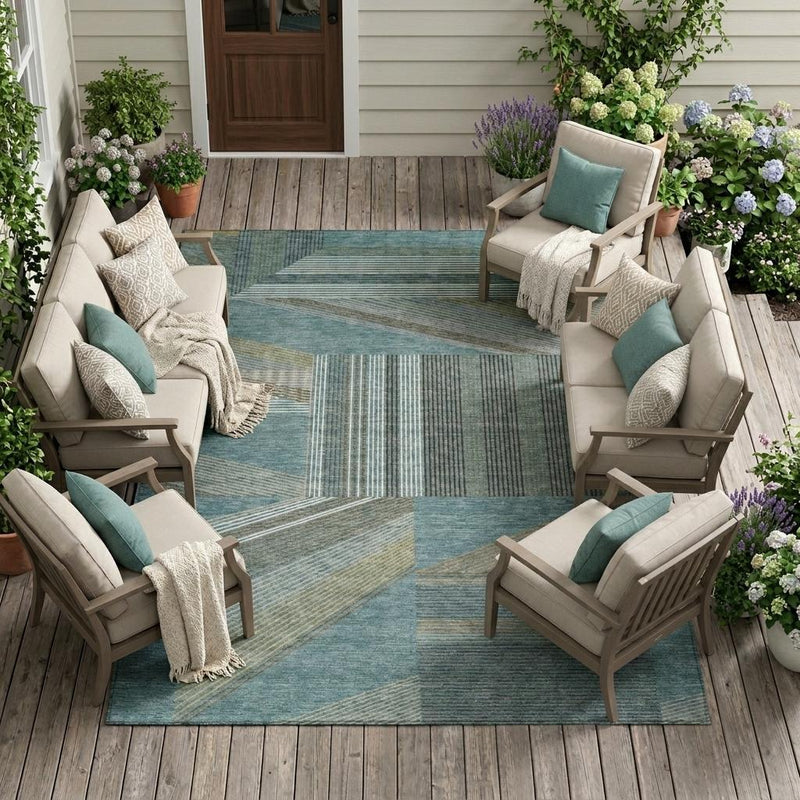 Teal blue geometric area rug with stripe and block pattern for indoor/outdoor use