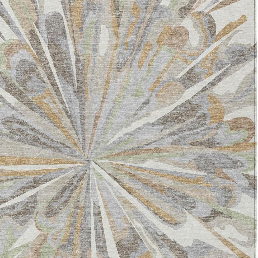 Ivory and silver abstract rug section with radial burst spokes and scattered pattern details