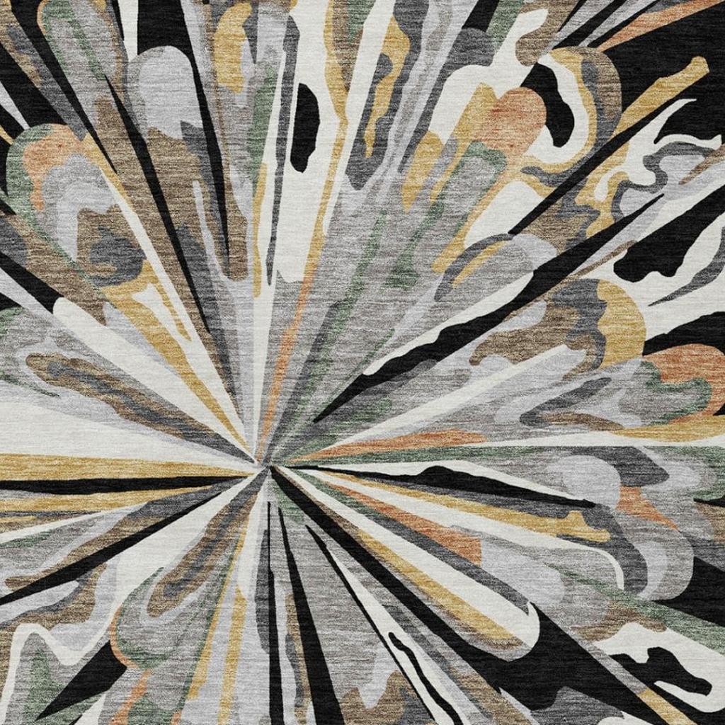 Abstract starburst area rug detail with dark rays and gray cream swirls