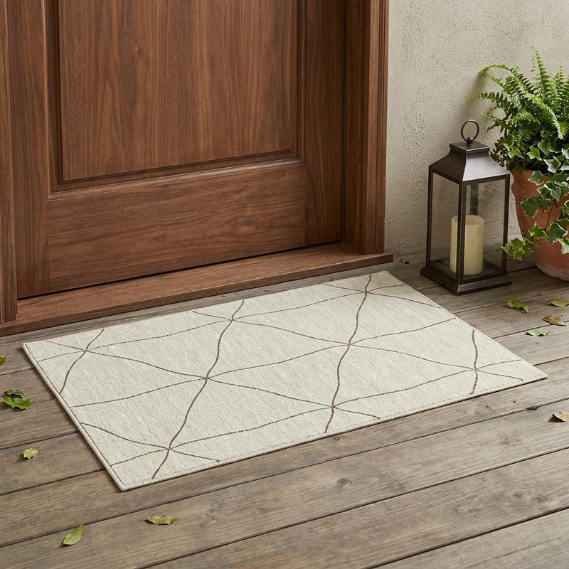 Cream geometric area rug with thin tan diamond line pattern