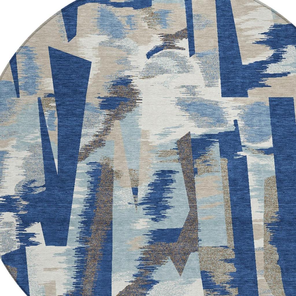 Round abstract area rug with blue vertical shapes and light beige base
