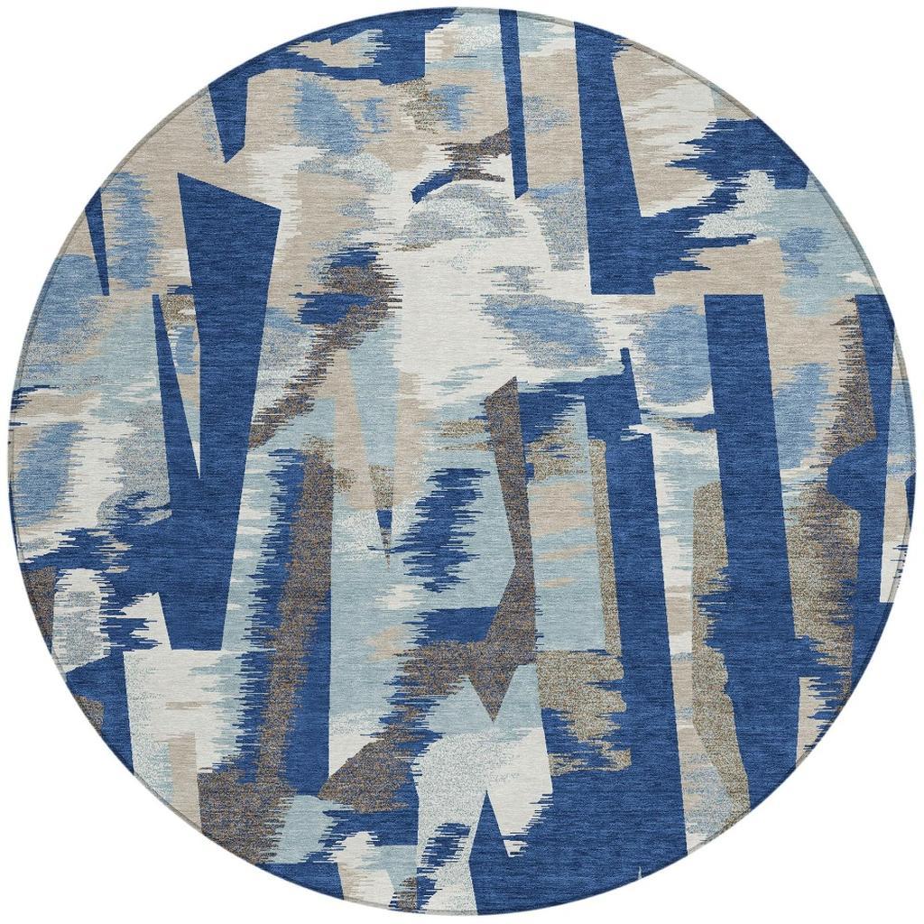 Round abstract area rug with bold blue and beige brushstroke columns