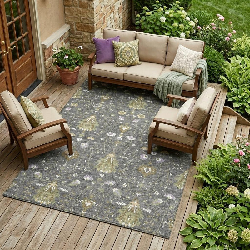 Gray and graphite oriental area rug with repeating floral and chandelier motifs, flat.