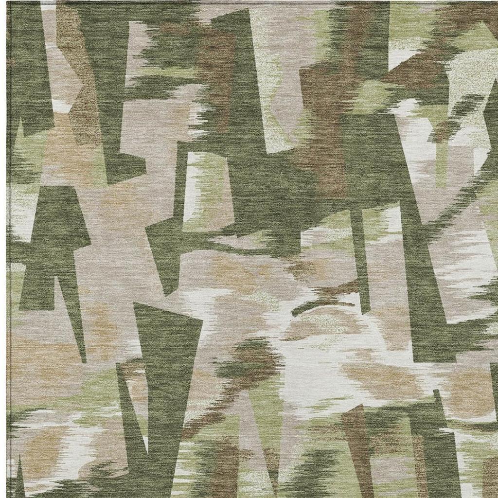 Olive green and cream abstract area rug featuring layered geometric shapes