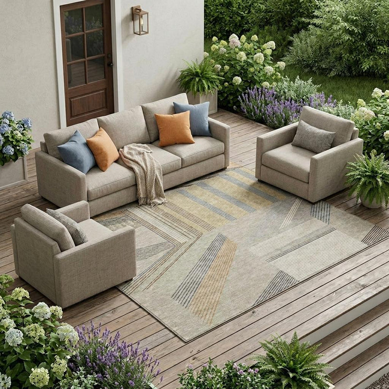 Beige geometric area rug on a wooden patio with outdoor seating around it