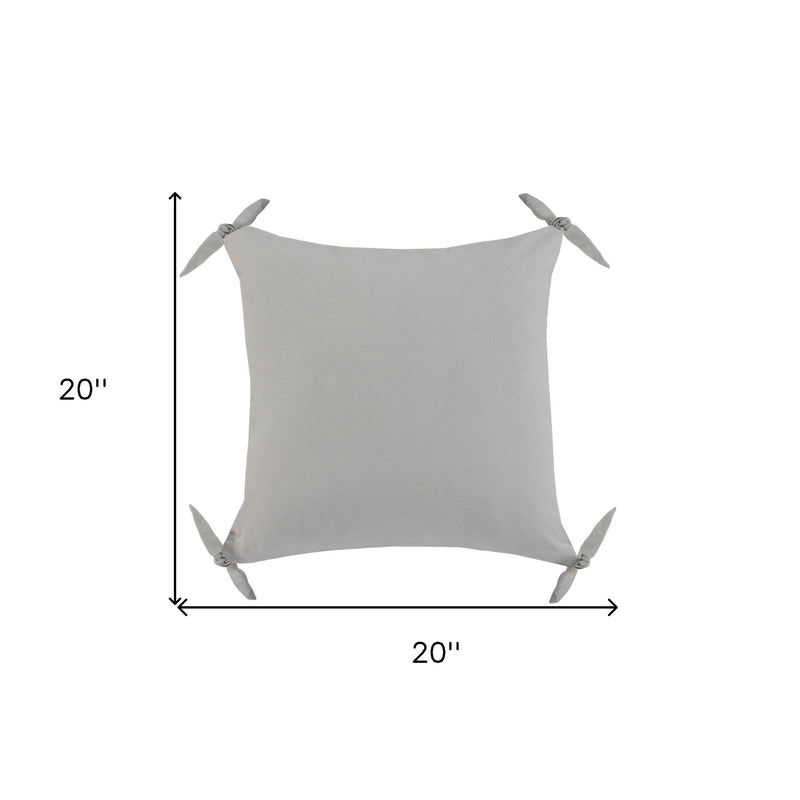 Light gray zippered cotton pillow cover, 20 in x 20 in with corner ties