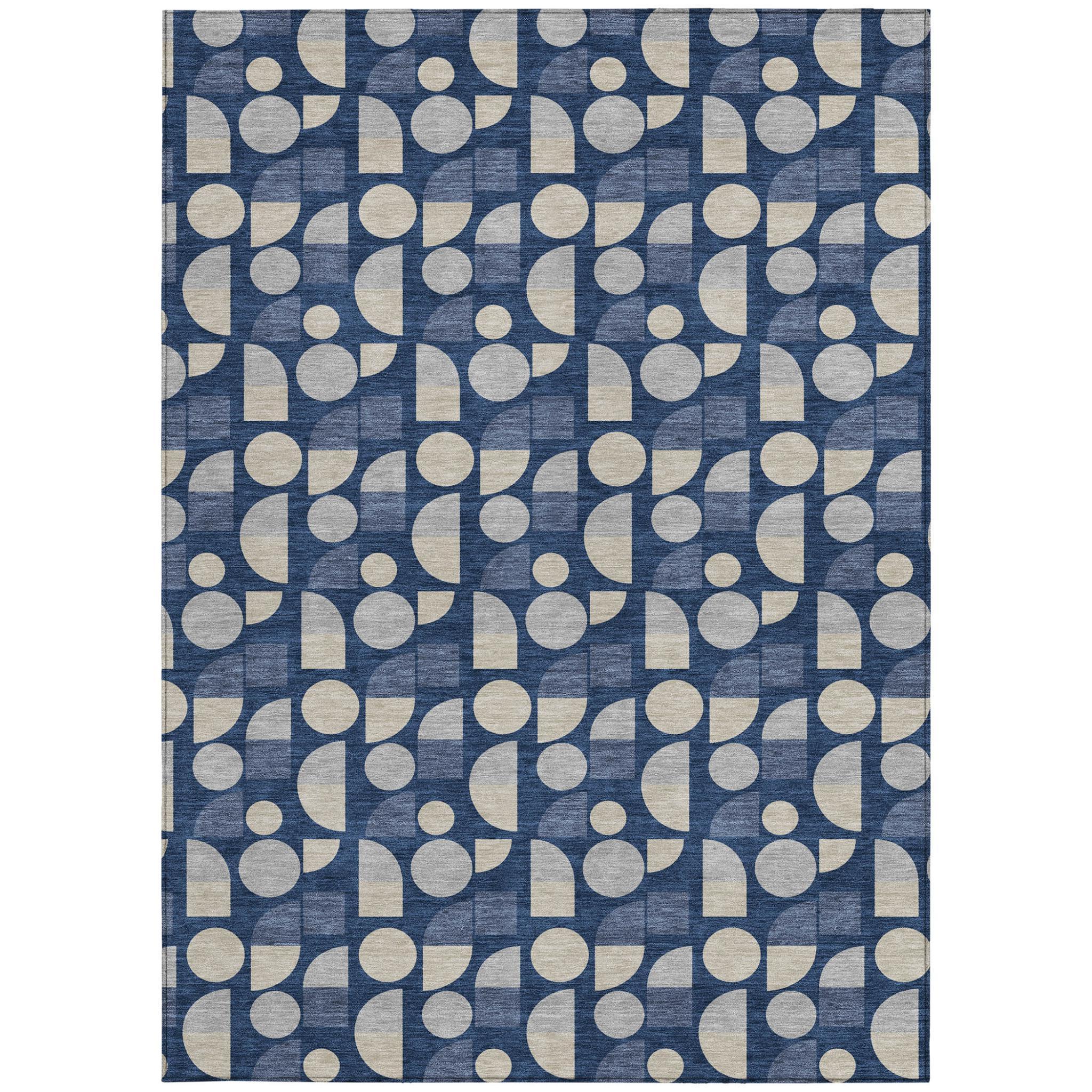 Navy blue geometric area rug with repeating circles and rectangles in beige