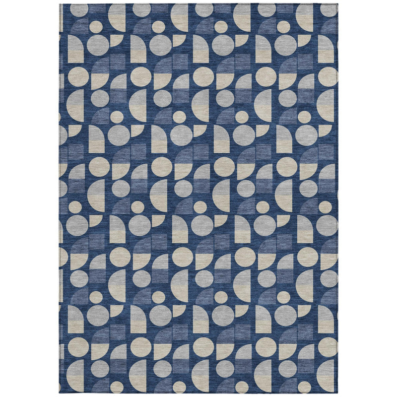Navy blue geometric area rug with repeating circles and rectangles in beige