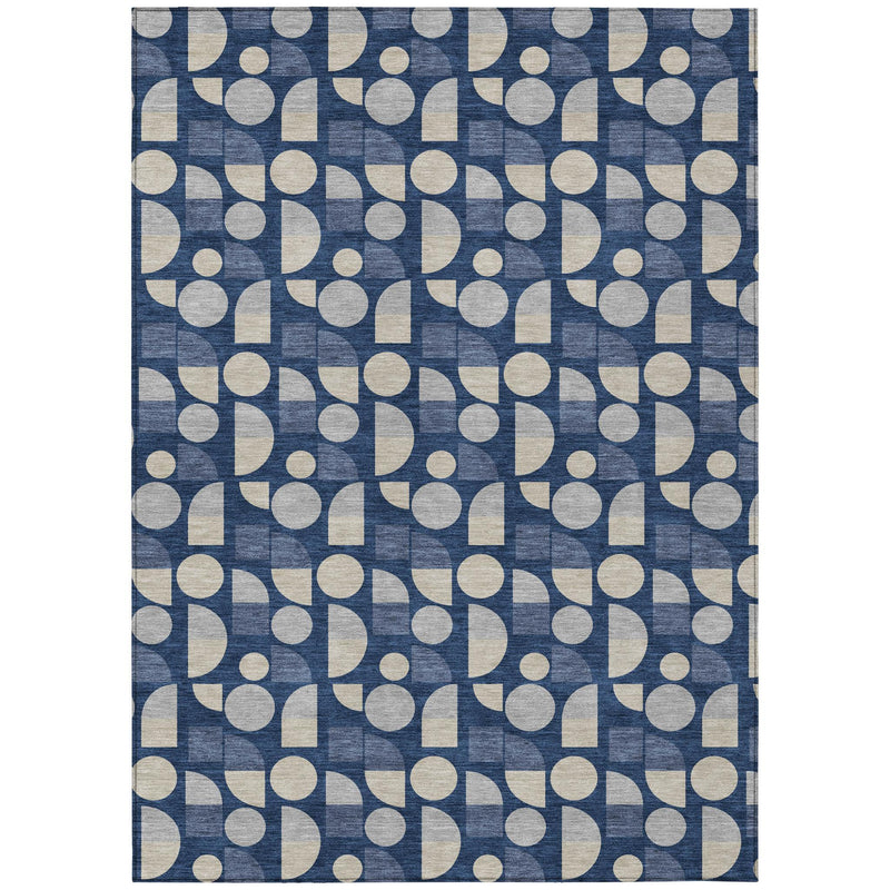 Navy blue geometric area rug with repeating beige circle-and-rectangle design