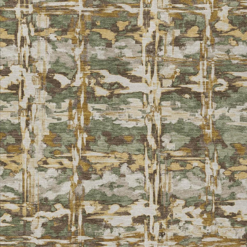 Close-up of olive green, beige, and gold abstract rug pattern with distressed lines