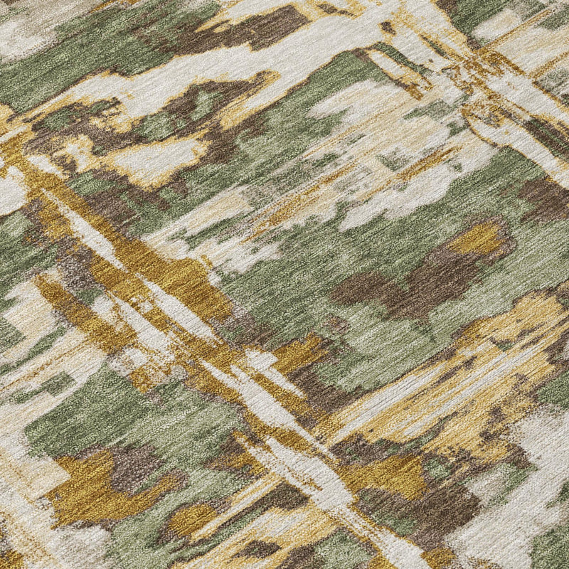 Diagonal close-up of olive green, cream, and gold abstract wash rug pattern