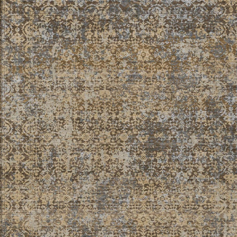 Abstract distressed area rug in tan, brown, and muted blue with textured look
