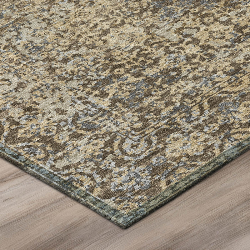 Corner detail of distressed abstract area rug with tan and blue edging