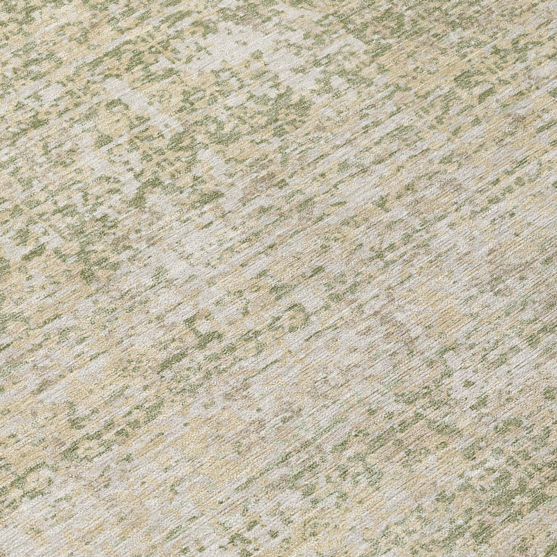 Rug surface with scattered sage green flecks on a cream abstract background