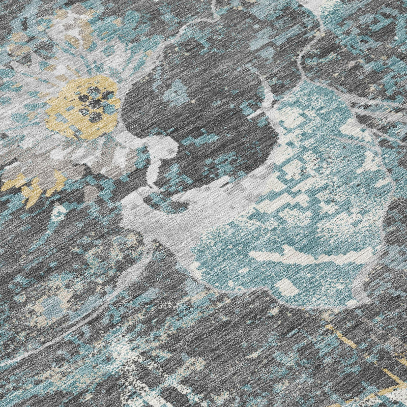 Abstract floral rug texture in gray, blue, white, and muted yellow accents