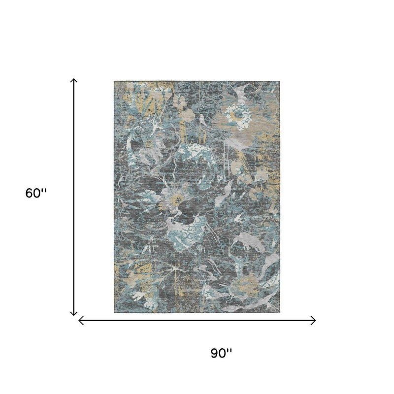 5x8 gray and blue abstract floral area rug with graphite, white, and gold accents