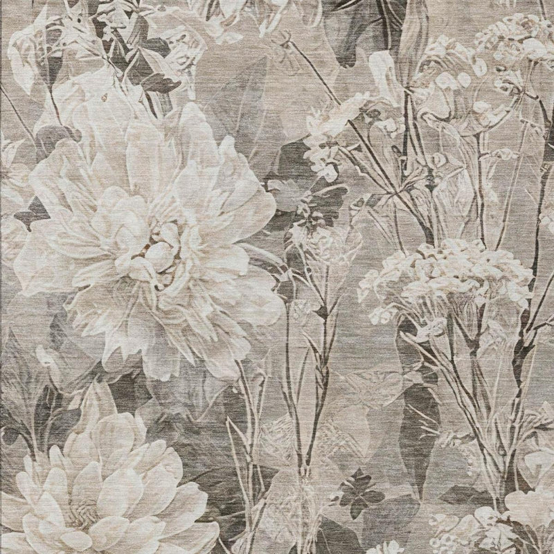 Close-up of taupe and brown floral area rug fabric with large white blooms